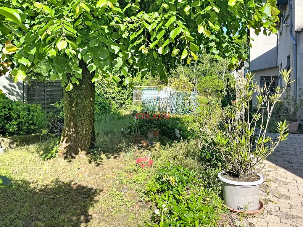 Maison avec garage et jardin proche d'ARGENTAT